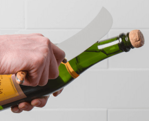 holiday gift guide for wine enthusiasts champagne saber
