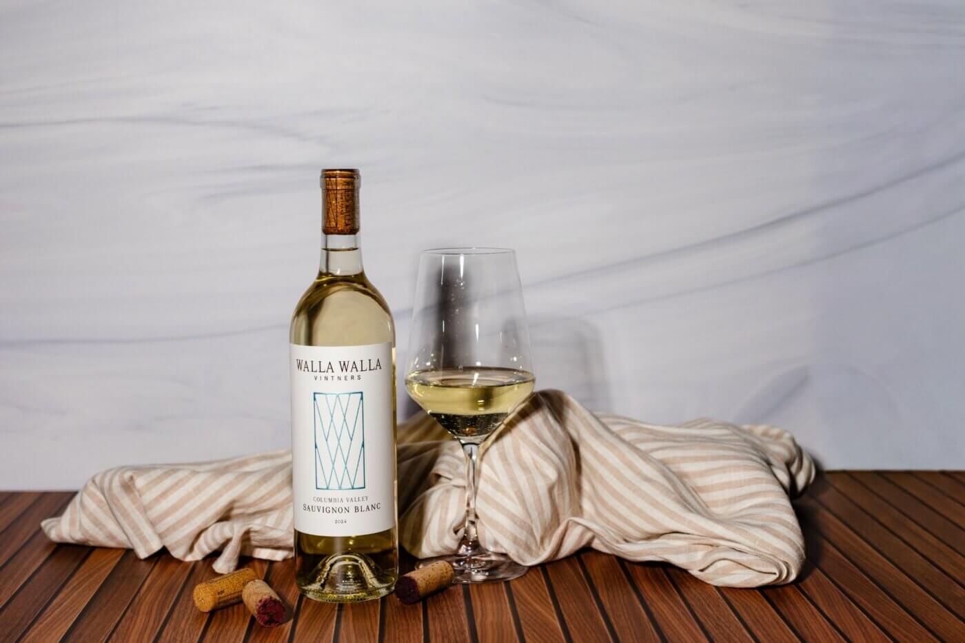 Columbia Valley Sauvignon Blanc 2024 bottle and wine glass filled up